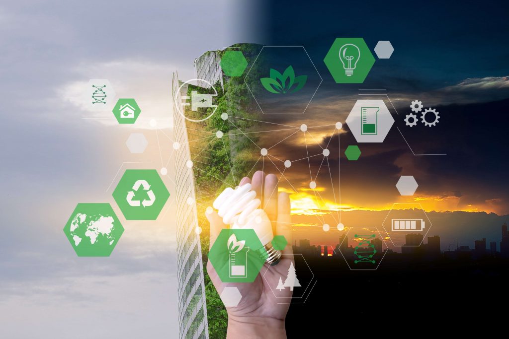 mão segurando lâmpada com ícones de tecnologia sustentável sobrepostos